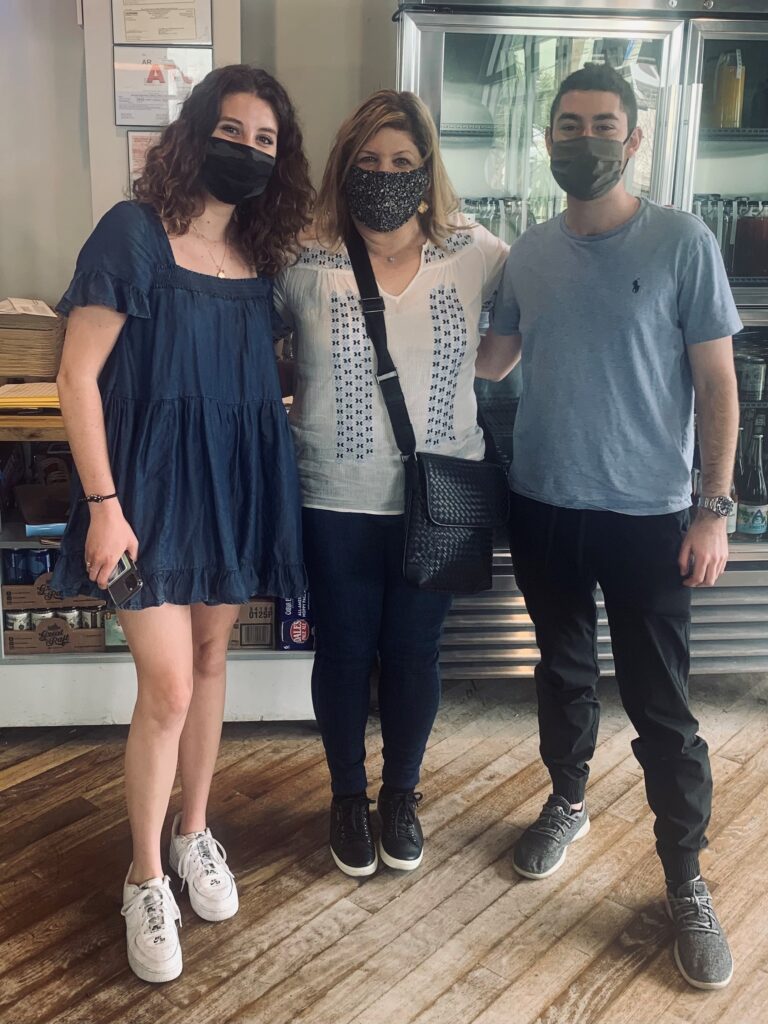 Jolene Risch standing with founders of Rize
